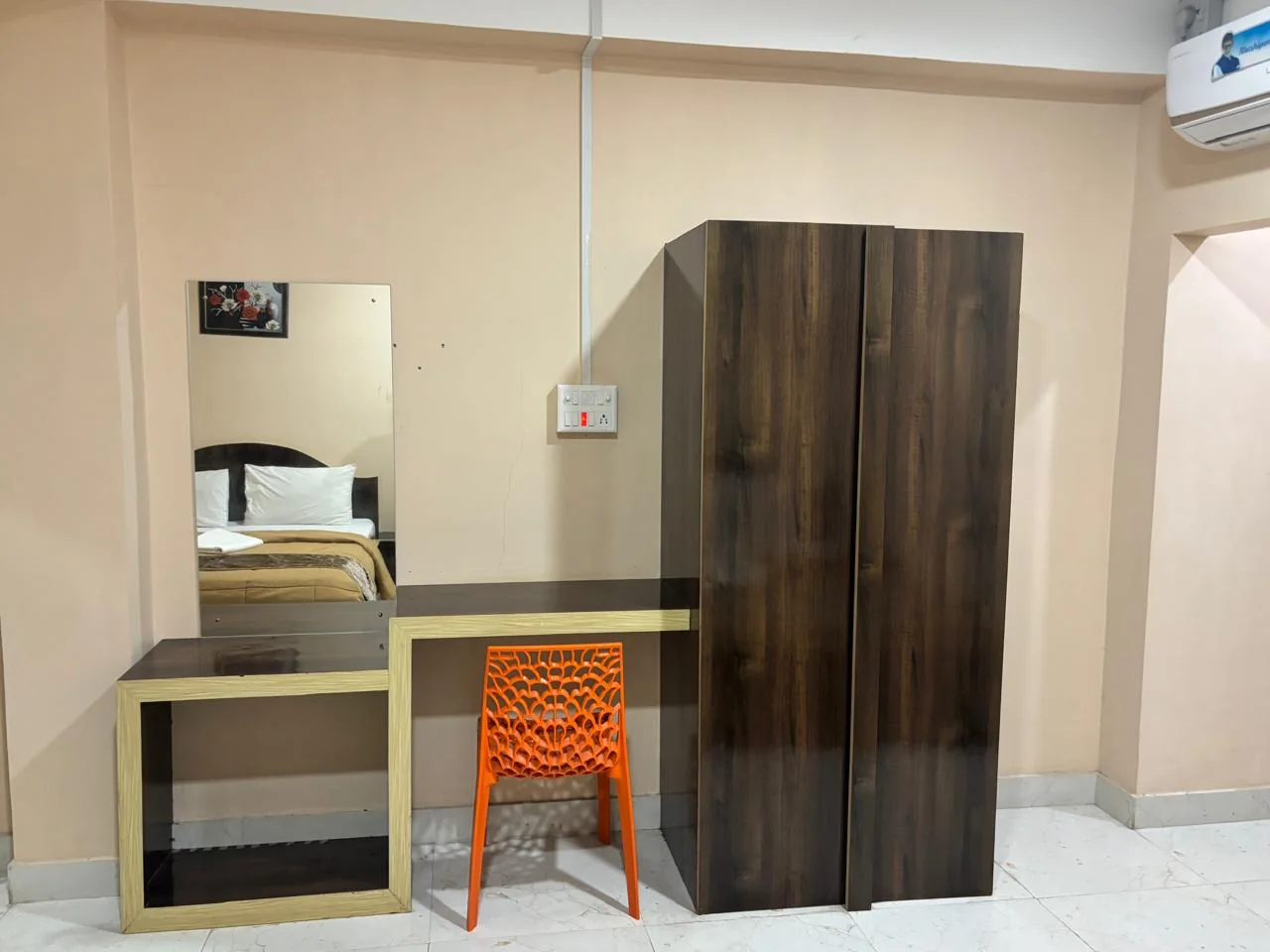 Room vanity and wardrobe at Hotel Landfall